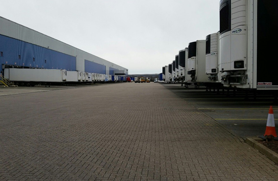 HGV trailers docked for loading. Others await their next duty
