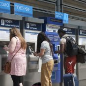Passenger buying ticket