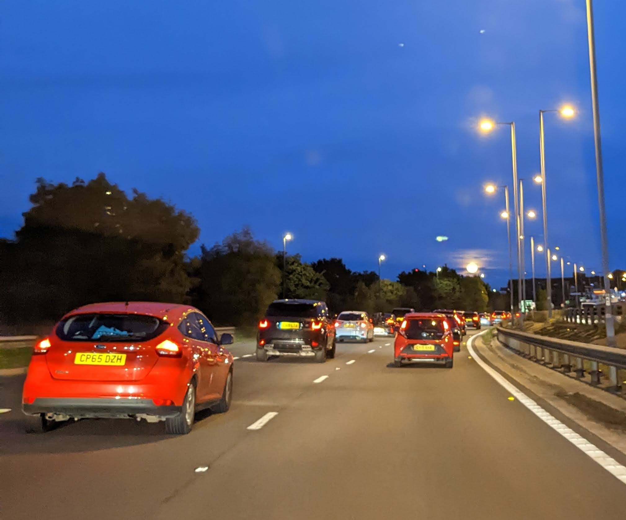 Cars on motorway at dusk